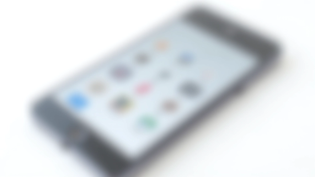 Pantalla de teléfono móvil mostrando diferentes aplicaciones de suscripción con iconos de servicios populares